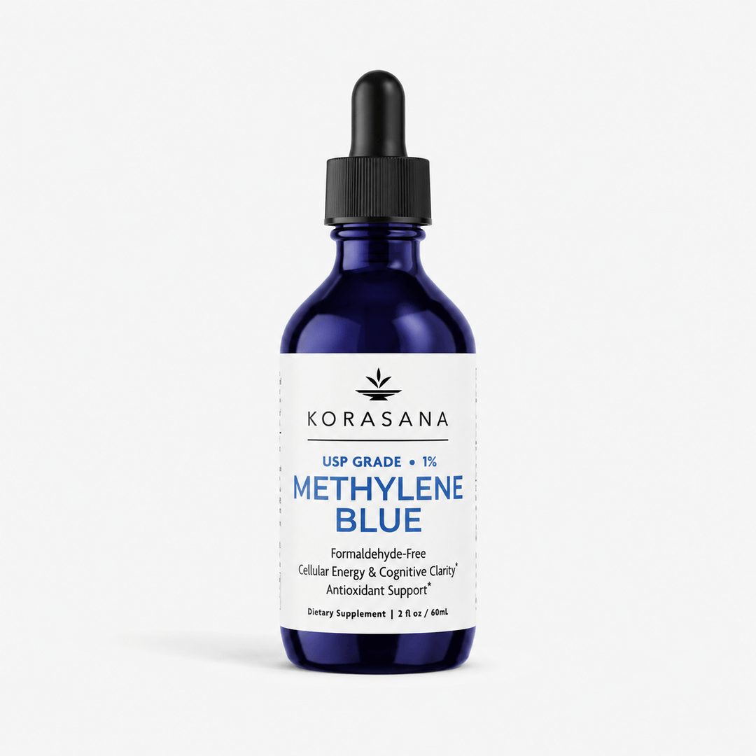 A 2 fl oz cobalt blue glass dropper bottle of Korasana Methylene Blue dietary supplement, featuring a white label with blue and black text, set against a clean white background.