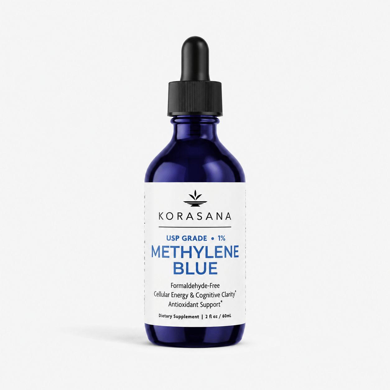 A 2 fl oz cobalt blue glass dropper bottle of Korasana Methylene Blue dietary supplement, featuring a white label with blue and black text, set against a clean white background.