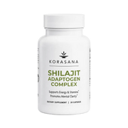 A white bottle of Korasana Shilajit Adaptogen Complex dietary supplement, featuring a white cap and a clean white label with green and black text, set against a light gray background.